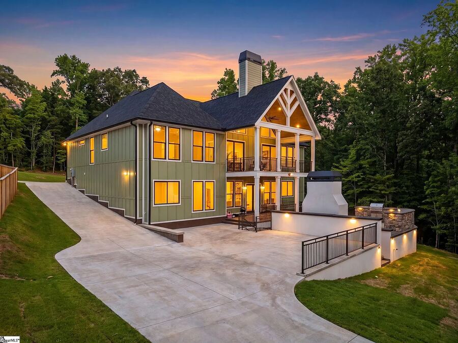 Completed custom home exterior at twilight
